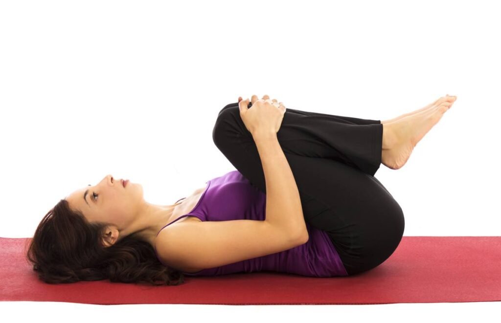 17 knees to chest pose yoga ThinkstockPhotos 472171955