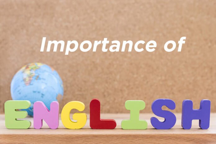 word english with globe over wooden background Language